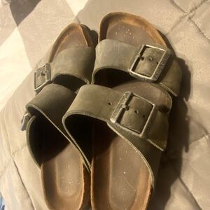 Birkenstocks, worn